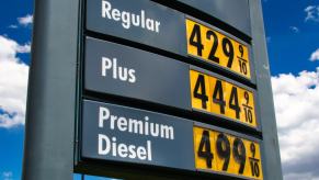 Finding cheap gas prices at station pumps is getting easier as the average cost has fallen double digits since 2023.