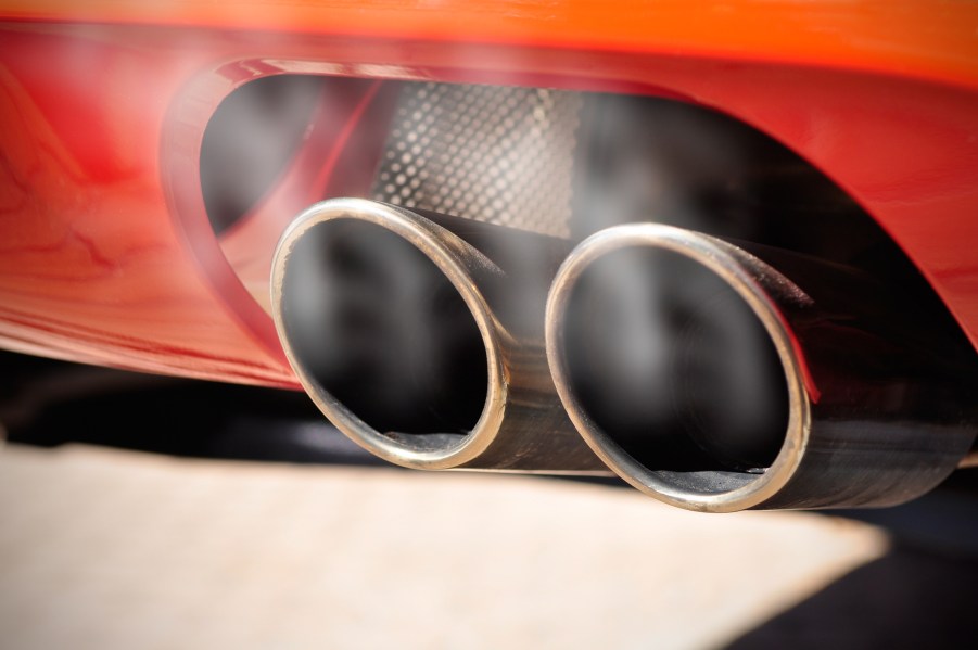 A dual exhaust with smoke