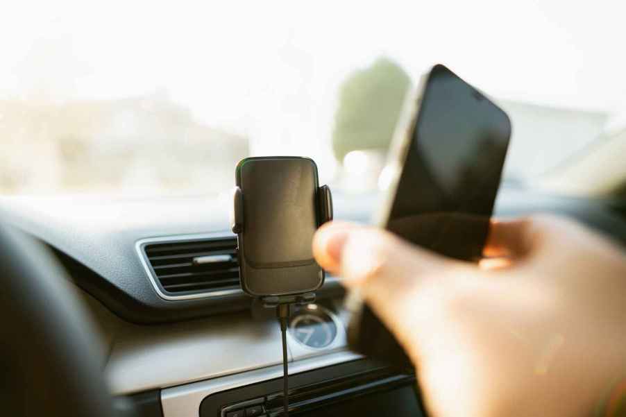 wireless phone charger inside a car per a 2024 survey this was the most desired new car feature car shoppers want