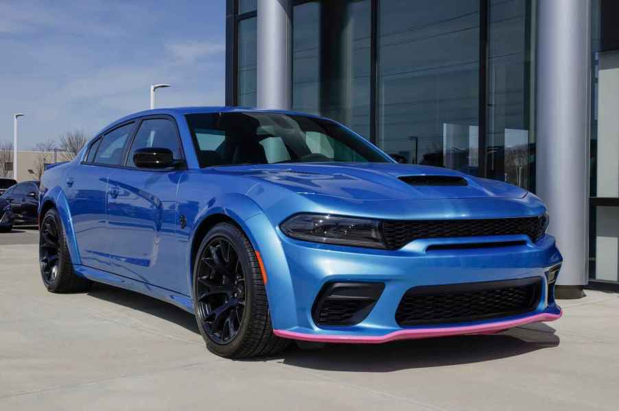 A blue 2023 Dodge Charger SRT Hellcat parked in right front angle view is one of the most expensive for car insurance companies to fully cover