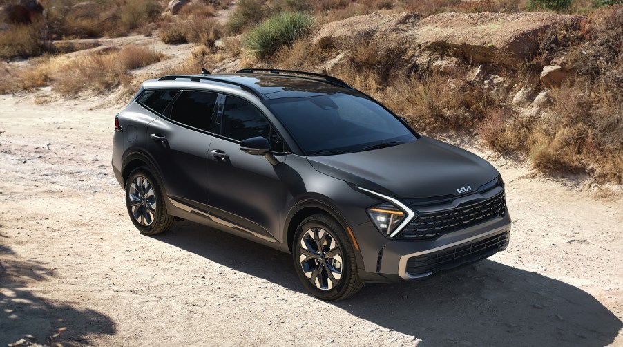 The 2024 Kia Sportage PHEV off-roading on a dirt road