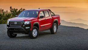 The 2024 Nissan Frontier parked at the top of a mountain