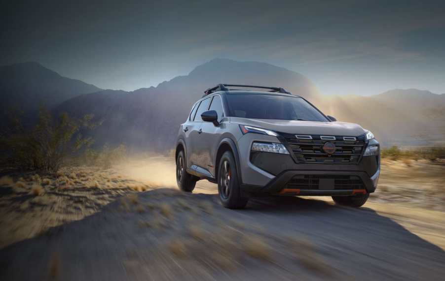 The 2025 Nissan Rogue on a dirt road