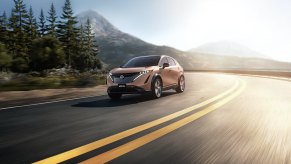 A Nissan Ariya, one of the EVs with an IIHS Top Safety Pick rating, takes a corner.