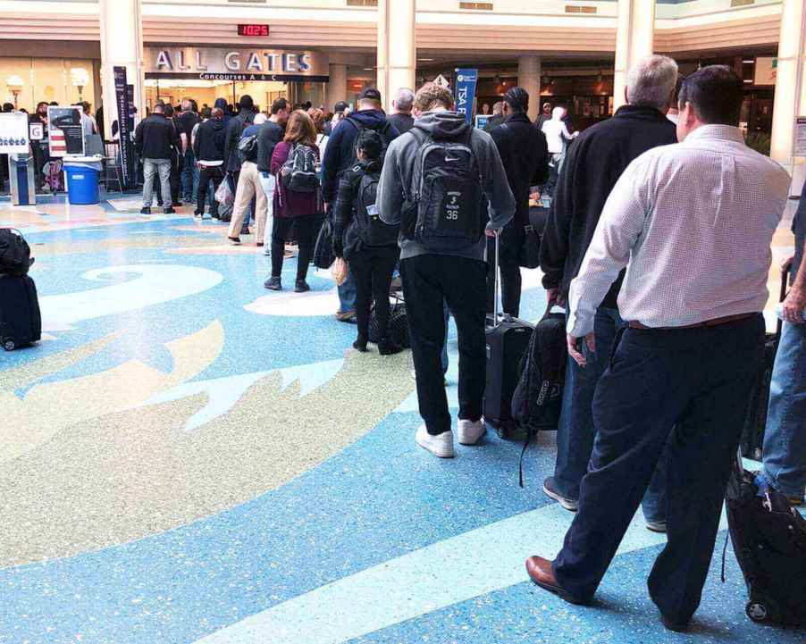 Travelers can take carry-ons through security, but flying with a gun outside of a checked bag is forbidden.