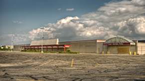 Abandoned store full of classic cars.