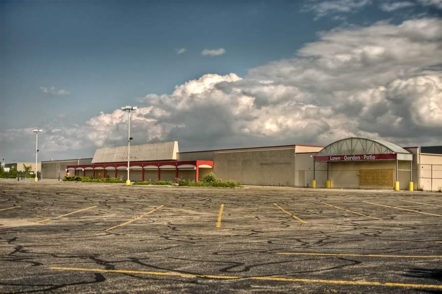 Abandoned store full of classic cars.