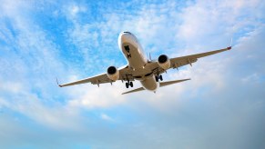 One plane passenger in Australia has some hefty fines for causing the pilot to turn a plane around over his unruly behavior.