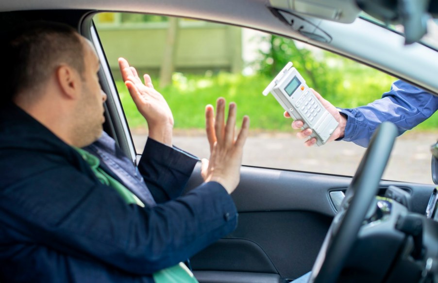 Driver refuses a breathalyzer test administered by a police officer.