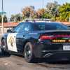 A California Highway Patrol Dodge Charger after it pulled over supercars and other vehicles.