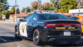 A California Highway Patrol Dodge Charger after it pulled over supercars and other vehicles.