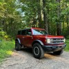 The 2024 Ford Bronco on a gravel road