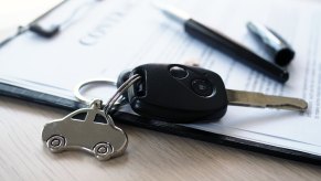 A set of keys on a type of car insurance policy.