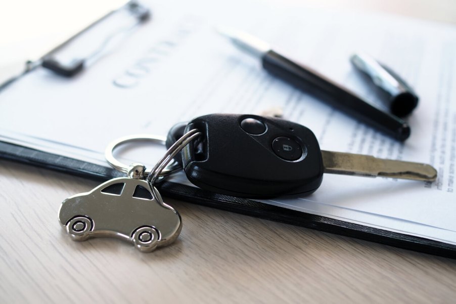 A set of keys on a type of car insurance policy.