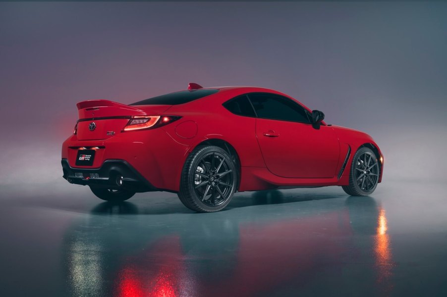 A red Toyota GR86 shows off its rear-end styling.