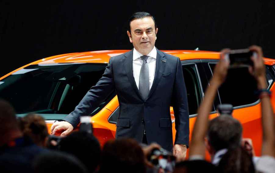 Ex-Nissan CEO Carlos Ghosn on stage at an auto show in 2016