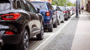 Cars parallel parked on city street