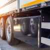 Semi-truck trailer toolbox mounted on left side in close view