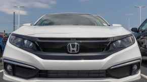 A white 2020 Honda Civic in close front view