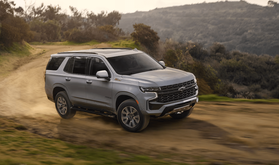 The 2024 Chevy Tahoe on a dirt road