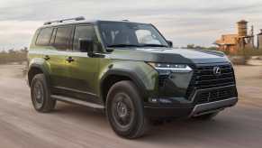 The 2024 Lexus GX on a dirt road