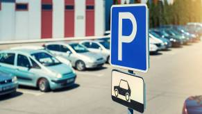 A busy parking lot can be a breeding ground for scams.