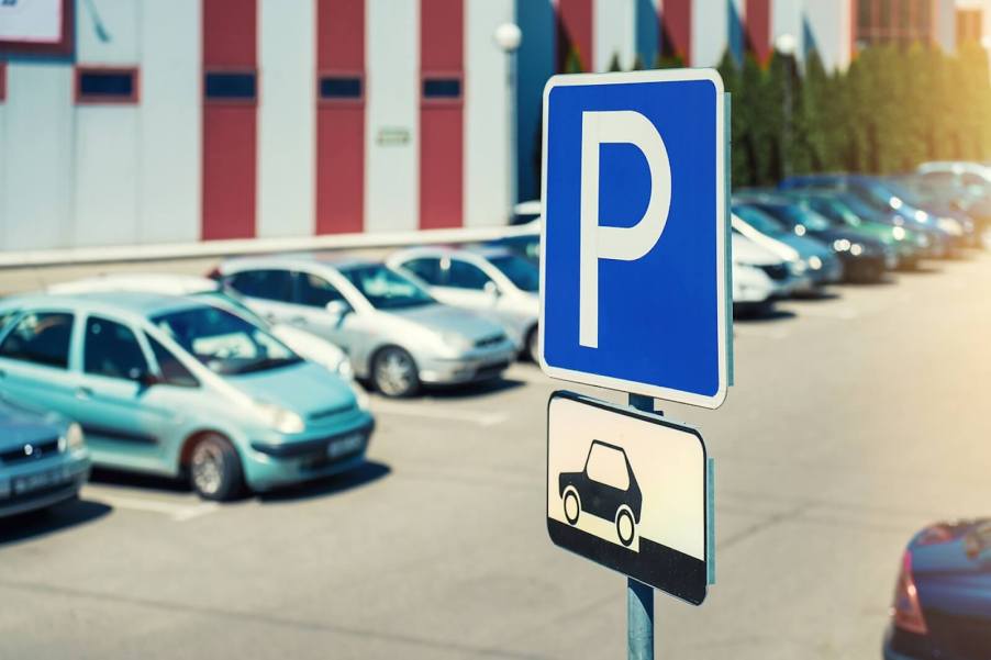 A busy parking lot can be a breeding ground for scams.