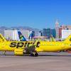 A Spirit Airlines flight on the runway before takeoff.