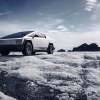 A Tesla Cybertruck in the snow and ice.