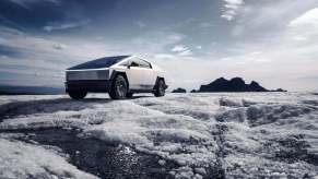 A Tesla Cybertruck in the snow and ice.