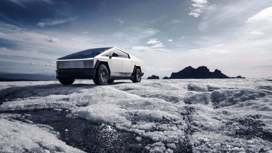 A Tesla Cybertruck in the snow and ice.