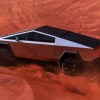 The Tesla Cybertruck off-roading through sand