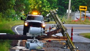 A truck at the scene of a downed power line