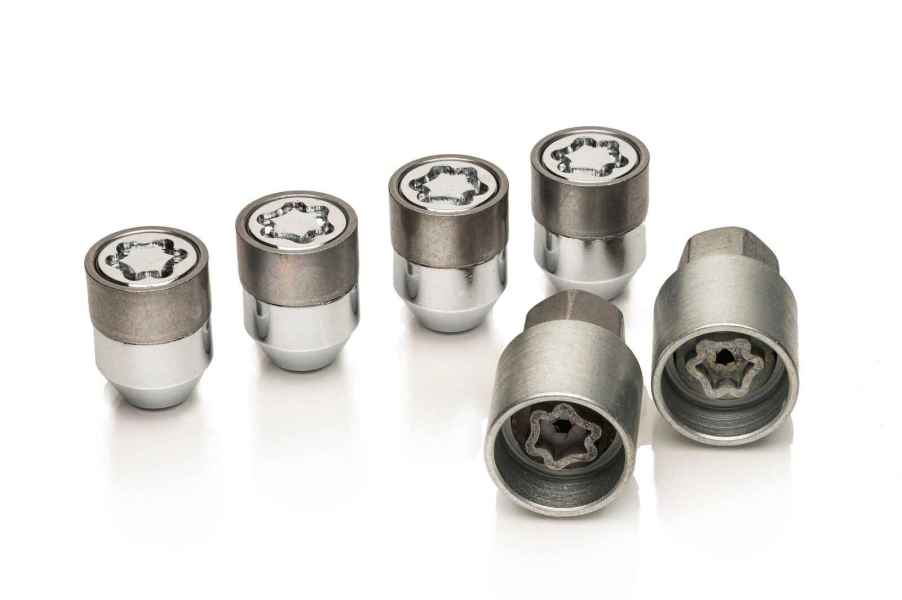 Six locking wheel nut keys for a car on a white background