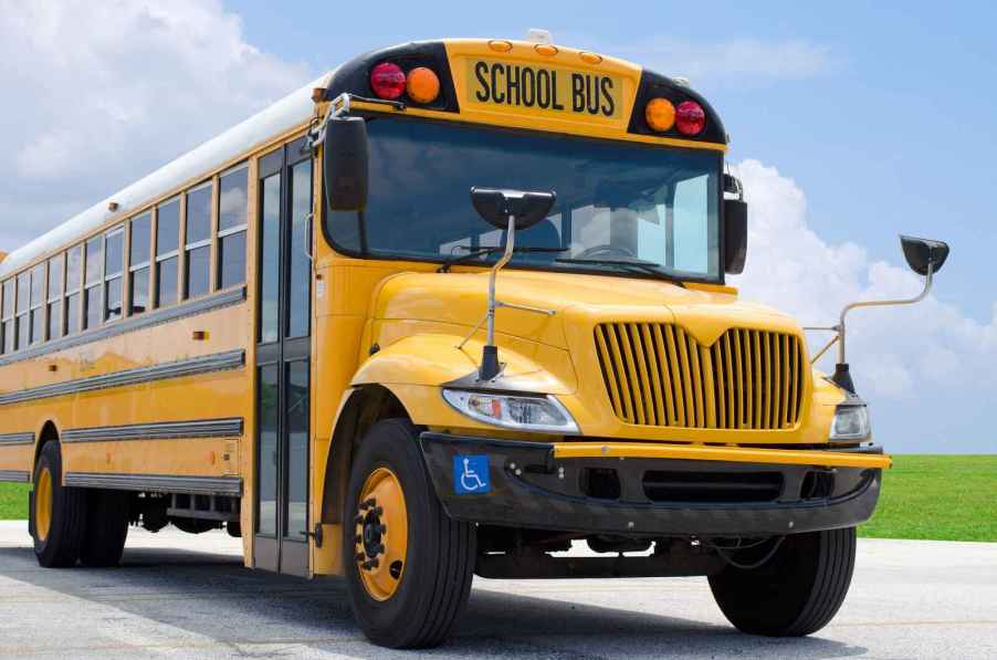 A school bus parked in right front angle view